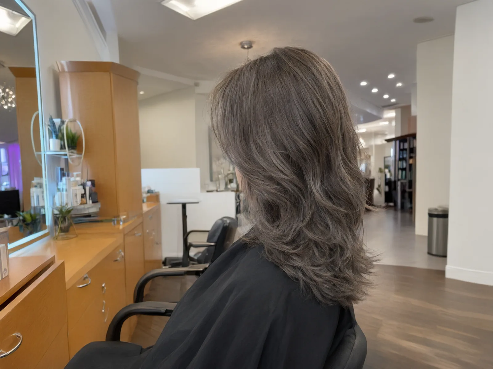 Cool ash-brown mid-length waves, in the salon chair at Salon D