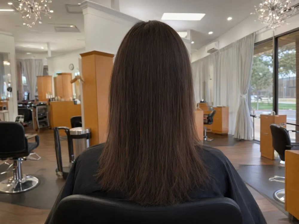 Before: fine, flat, shoulder-length brunette hair