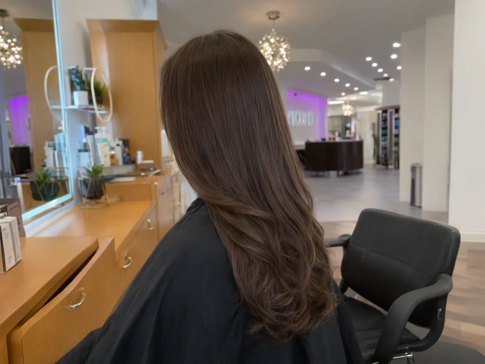 Straight, sleek, glass-smooth brunette hair after a keratin treatment, Salon D Dallas